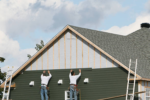 Professional Siding technician working in Peabody, MA